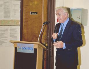 Congressman Maurice Hinchey addresses the audience at Astor school opening